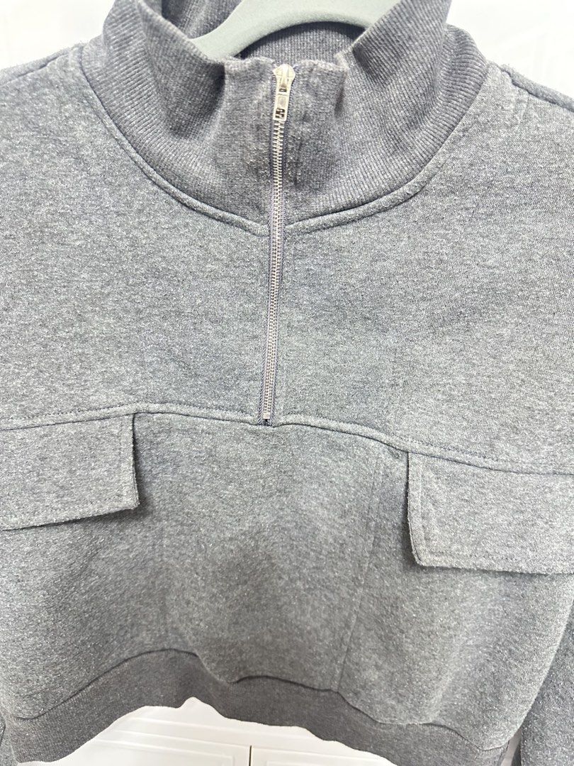 SHEIN Grey Zip Sweatshirt with Pockets Jacket (Category: Coats, Jackets and Outerwear) located in Quezon City. Submitted by jeydeegmr (Listing ID 1462411263, Image 3). Description: - Grey cropped sweatshirt - Quarter zip neckline - Two front pockets - Ribbed cuffs and hem - Comfy and casual style - Ideal for layering or wearing alone - Easy to pair with jeans or leggings.