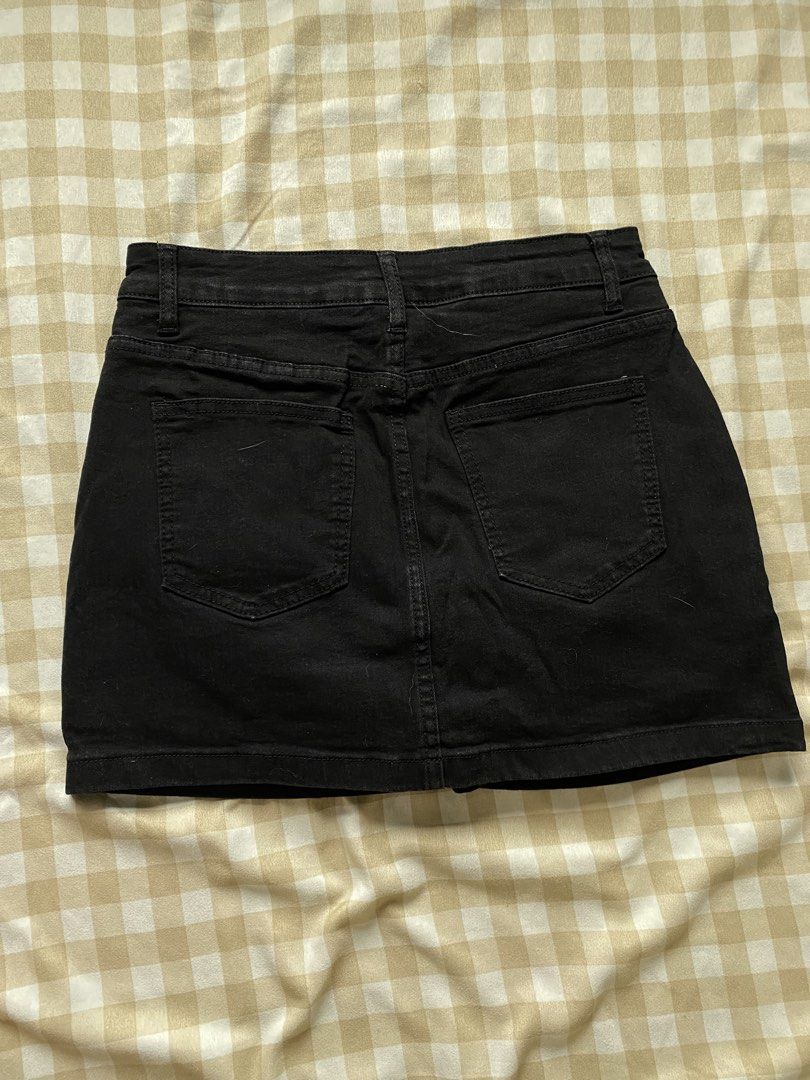 SHEIN High-Waisted Black Denim Skort (Category: Other Bottoms) located in Santa Maria. Submitted by closetclearout_co (Listing ID 1462276374, Image 3). Description: Brand: SHEIN Color: Black Material: Denim / Cotton Blend Condition: Like New (Tried on once, never worn out) Details: High-waisted fit, built-in safety shorts underneath, classic 5-pocket denim design, front button and zip fly closure.