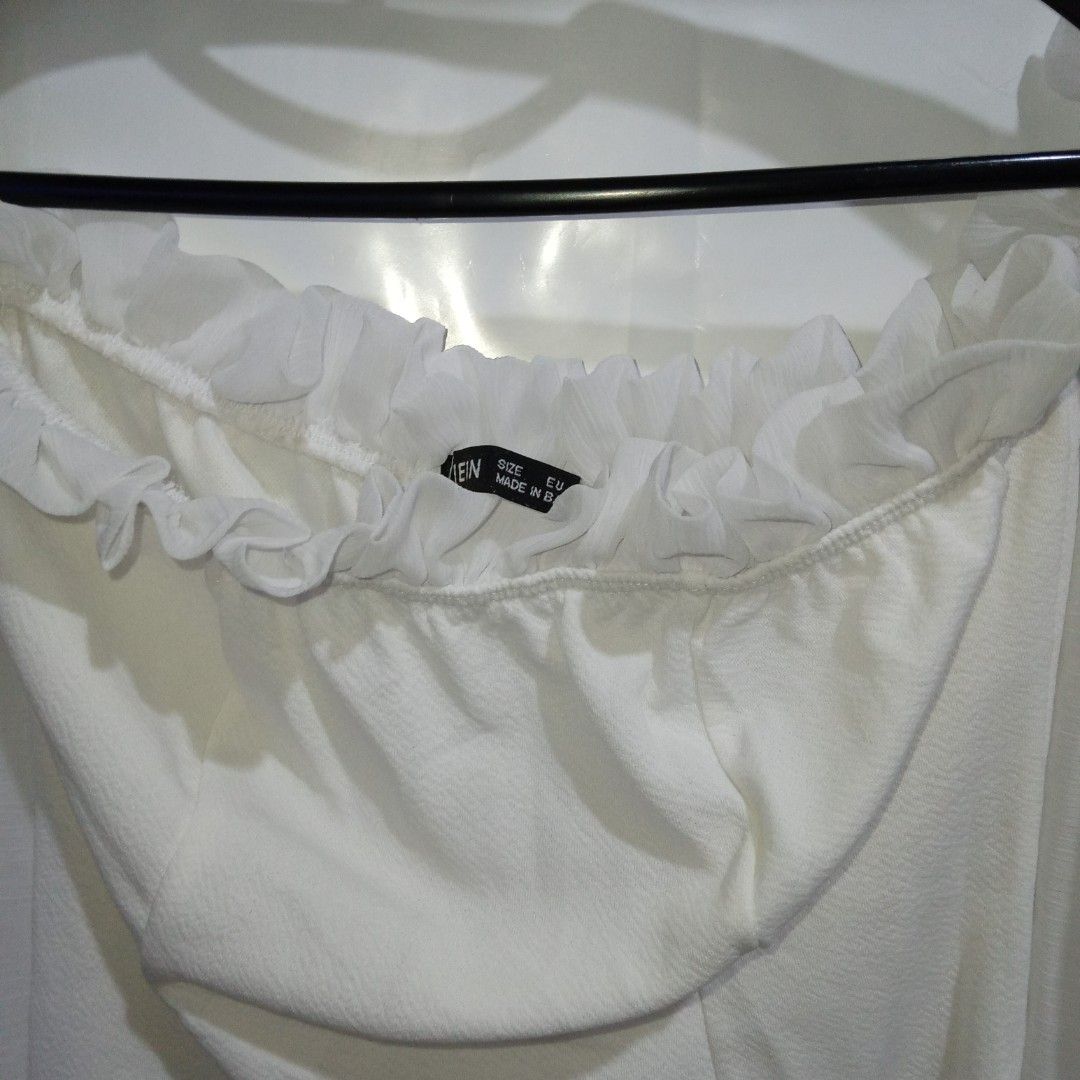SHEIN White Ruffle Off-Shoulder Puff Sleeve Top (Category: Blouses) located in Manila. Submitted by cian.collectives (Listing ID 1462382231, Image 3). Description: ✨ Title: SHEIN White Ruffle Off-Shoulder Puff Sleeve Top Description: Fit to XS-S, Good quality. Chic and elegant to wear. Price: 120.00 Flaws: none Payment Methods: Gcash, Maya (Payment First - No COD) 📍 Note: PLEASE MANAGE YOUR EXPECTATIONS, PRELOVED ITEMS, NO CANCELLATION. Feel fre