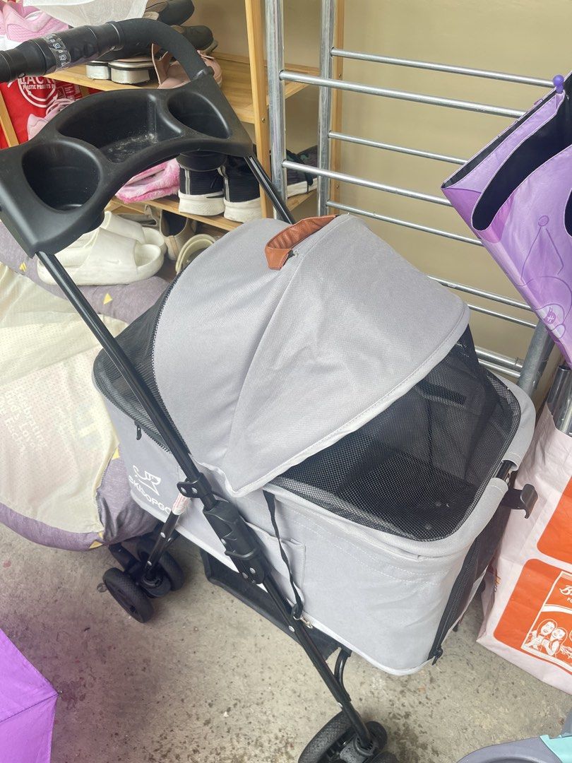 Skisopgo Pet Stroller - Grey (Category: Homes & Other Pet Accessories) located in Manila. Submitted by caraaaa.123 (Listing ID 1462309929, Image 1). Description: 3 in 1, can be hand carry or use for car seat - Grey SkipDoggo pet stroller - Canopy with mesh windows for ventilation - Convenient top storage tray - Sturdy wheels for smooth rides - Perfect for taking your pet on adventures.