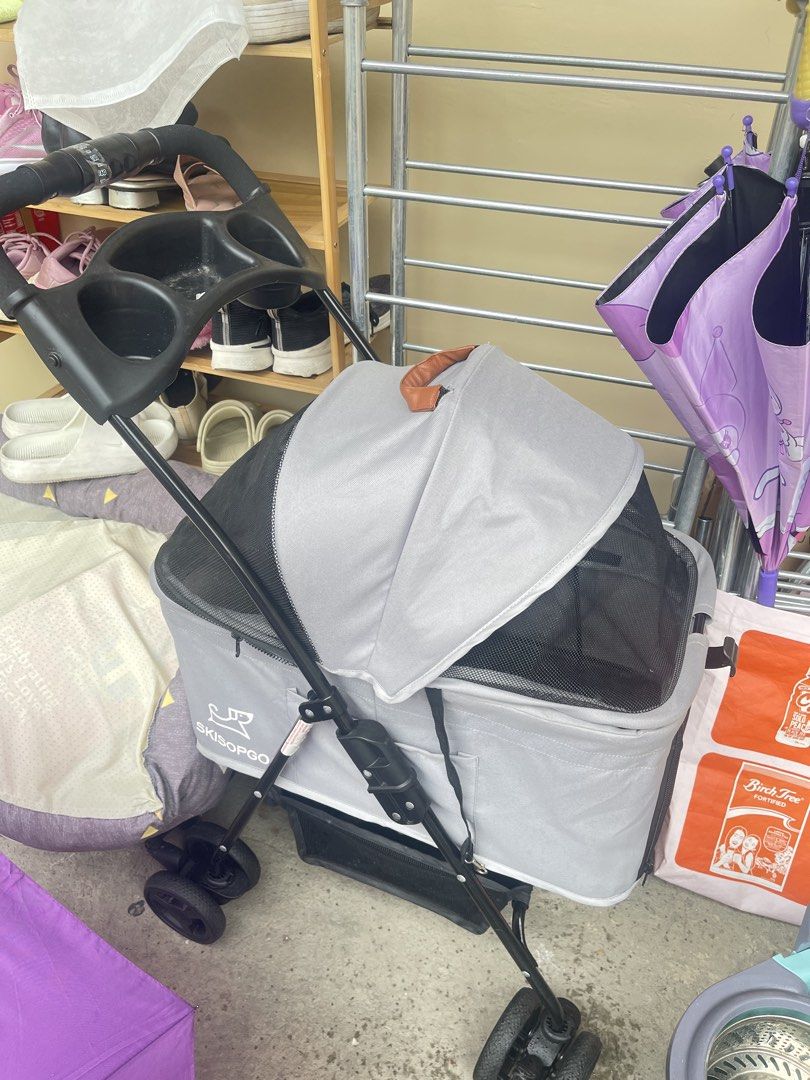 Skisopgo Pet Stroller - Grey (Category: Homes & Other Pet Accessories) located in Manila. Submitted by caraaaa.123 (Listing ID 1462309929, Image 2). Description: 3 in 1, can be hand carry or use for car seat - Grey SkipDoggo pet stroller - Canopy with mesh windows for ventilation - Convenient top storage tray - Sturdy wheels for smooth rides - Perfect for taking your pet on adventures.