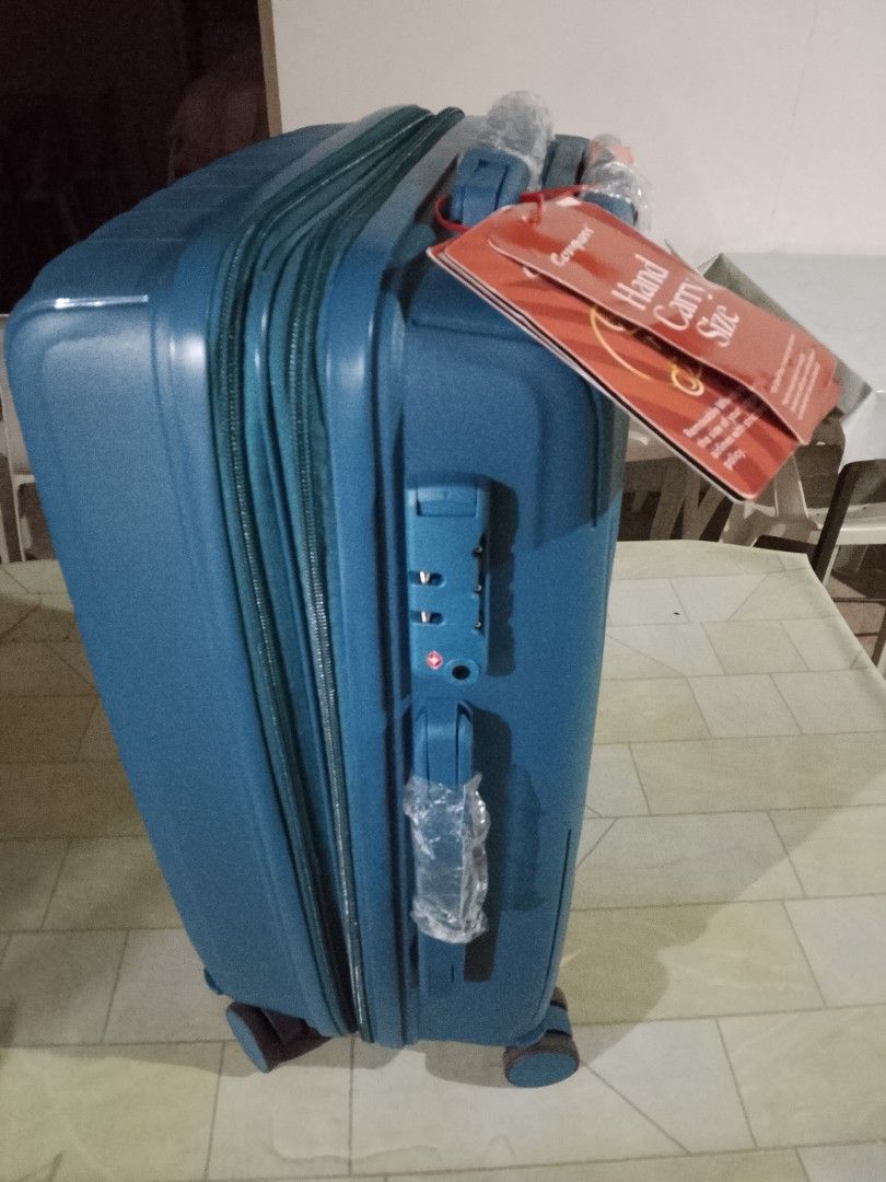 Skyway Teal Hard Shell Luggage - Hand Carry Size (Category: Luggage) located in Manila. Submitted by grandstar-1591 (Listing ID 1462399695, Image 2). Description: - Teal hard shell suitcase - Hand carry size, ideal for short trips - Built-in TSA lock for security - Smooth rolling wheels for easy maneuverability - Protective plastic wrap still on handles and lock - Ready for your next adventure!.