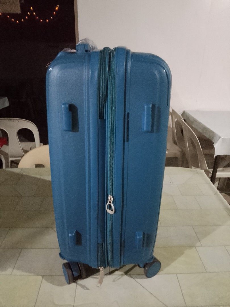 Skyway Teal Hard Shell Luggage - Hand Carry Size (Category: Luggage) located in Manila. Submitted by grandstar-1591 (Listing ID 1462399695, Image 3). Description: - Teal hard shell suitcase - Hand carry size, ideal for short trips - Built-in TSA lock for security - Smooth rolling wheels for easy maneuverability - Protective plastic wrap still on handles and lock - Ready for your next adventure!.