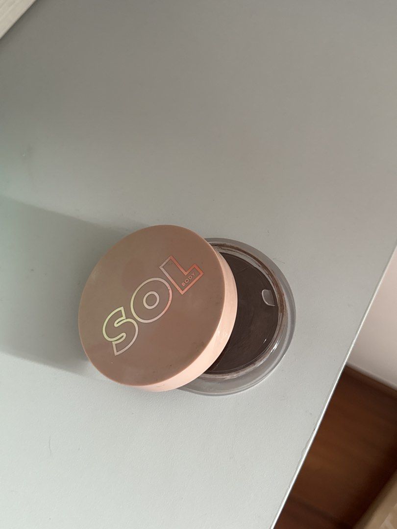 Sol Body Face & Body Bronzing Balm - Deep (Category: Makeup) located in Manila. Submitted by bears_closet (Listing ID 1462263398, Image 1). Description: - Sol Body Face and Body Bronzing Balm - Shade: Deep - Achieve a beautiful bronzed look - Vegan, Cruelty-Free - Free from Parabens, Phthalates, and Mineral Oil - Made in the USA - For external use only. Avoid eyes. Keep away from children and pets. 95% full!! Barely used :) .