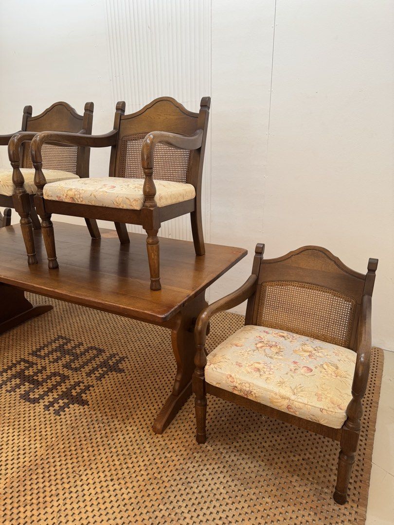Solid wood dining set (Category: Tables & Sets) located in Quezon City. Submitted by matetdevis13 (Listing ID 1462390783, Image 3). Description: KITSUTSUKI MARK Vintage Solid Wood Dining Set with Woven Rattan Back Chairs Price: 16,900 Table: L63 x W33.5 x H25 Chairs: L23.5 x W20 x H29/16 In good condition Code MJS80-MJ711 The chairs have turned wooden legs/arms and woven cane (rattan) backrests, giving the set a classic vintage/colonial look..
