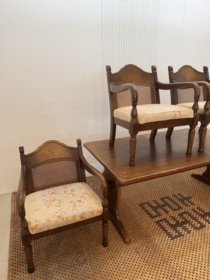 Solid wood dining set (Category: Tables & Sets) located in Quezon City. Submitted by matetdevis13 (Listing ID 1462390783, Image 2). Description: KITSUTSUKI MARK Vintage Solid Wood Dining Set with Woven Rattan Back Chairs Price: 16,900 Table: L63 x W33.5 x H25 Chairs: L23.5 x W20 x H29/16 In good condition Code MJS80-MJ711 The chairs have turned wooden legs/arms and woven cane (rattan) backrests, giving the set a classic vintage/colonial look..