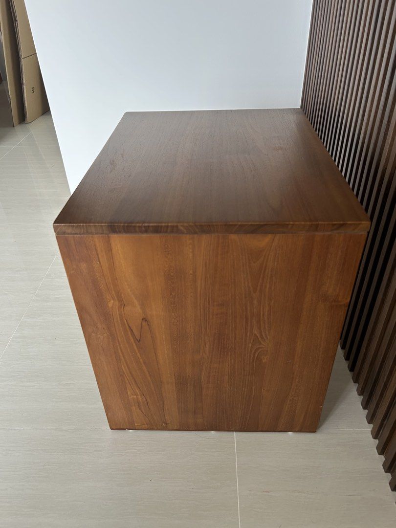 Solid Wood Side Table / Bedside Table (Category: Tables & Sets) located in Singapore. Submitted by jonson90 (Listing ID 1462283766, Image 3). Description: - 56cm (L) by 51cm (H) by 44 (W) - Solid wood construction - Warm, inviting wood tone - Versatile use: bedside table or accent table - Simple and modern design - Fits well in various spaces.
