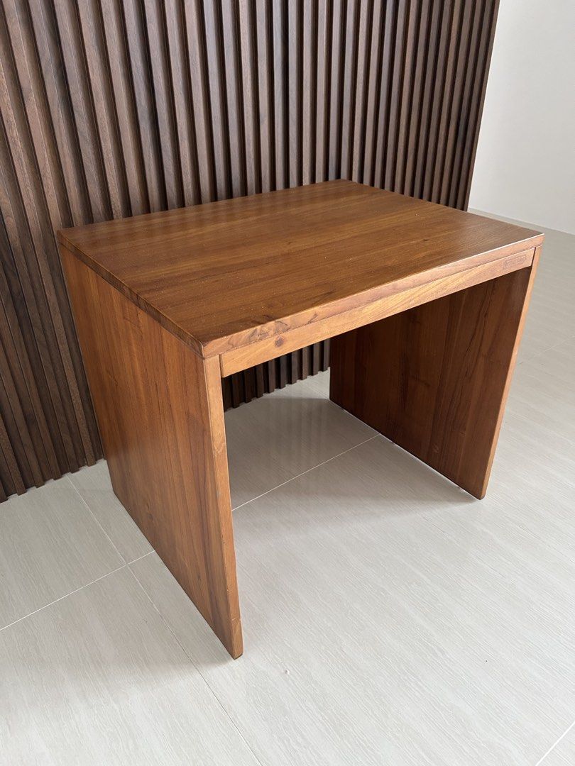 Solid Wood Side Table / Bedside Table (Category: Tables & Sets) located in Singapore. Submitted by jonson90 (Listing ID 1462283766, Image 1). Description: - 56cm (L) by 51cm (H) by 44 (W) - Solid wood construction - Warm, inviting wood tone - Versatile use: bedside table or accent table - Simple and modern design - Fits well in various spaces.