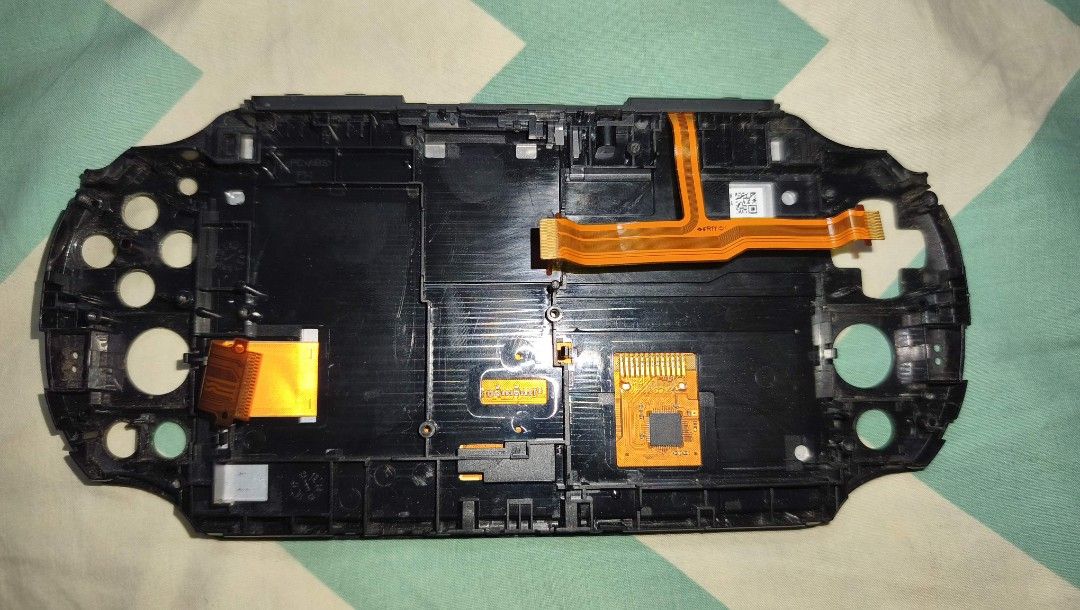 Original PS Vita Slim Parts: LCD Screen (Category: PlayStation) located in Davao. Submitted by duriandragonfruit (Listing ID 1462425448, Image 2). Description: - Original Black Sony PS Vita Screen Replacement - Power Button and Volume components included - Screen comes with Tempered Glass issues: screw holes are damaged.