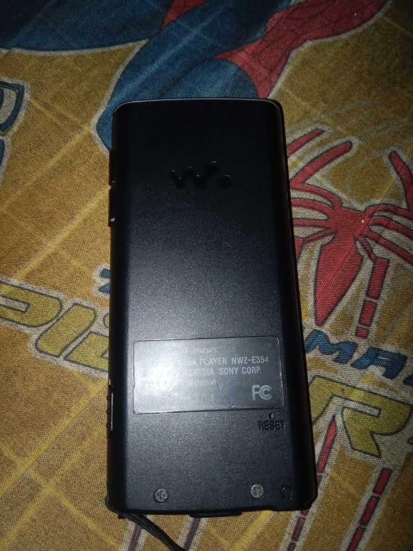 Sony Walkman NWZ-E354 MP3 Player Dark Red (Category: Portable Music Players) located in Magsaysay. Submitted by cleverdog_bcf581 (Listing ID 1462362847, Image 2). Description: - Sony Walkman MP3 Player - Model: NWZ-E354 - Color: Dark Red - Includes attached lanyard - Perfect for music on the go - Fully functional and works well - Has 30gb in it can download 1000 songs - Has charger and usb for transfering I also had a case but I'll give you 1 if 