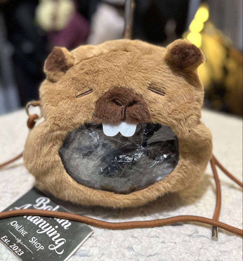Squirrel Head Sling Bag (Category: Babies & Kids Fashion) located in Rizal. Submitted by babamamanyingonlineshop (Listing ID 1462275079, Image 1). Description: .