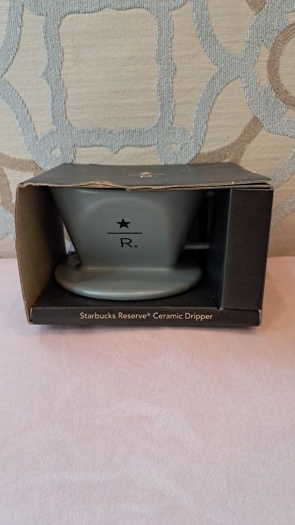 Starbucks Reserve Ceramic Dripper (Category: Coffee & Tea Tableware) located in Santa Rosa. Submitted by majanice (Listing ID 1462283049, Image 1). Description: - Authentic Starbucks Reserve Ceramic Coffee Dripper - Sleek, elegant grey color - Features the iconic Starbucks Reserve logo - Comes in its original, pristine packaging - Ideal for brewing your perfect cup of coffee - A must-have for any serious coffee enthusiast condition brand new with