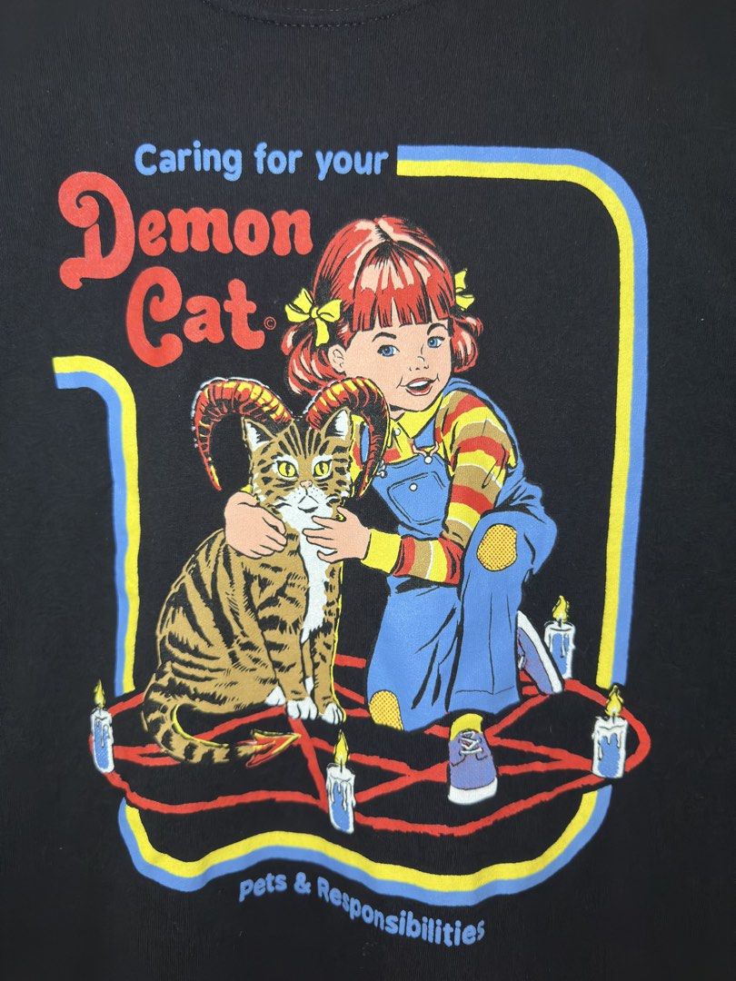 Steven rhodes demon cat shirt (Category: Tshirts & Polo Shirts ) located in Sarrat. Submitted by villtage (Listing ID 1462324898, Image 2). Description: -washed and ready to wear -21x28.5 dimes -color rate 9.5/10 -issue: tapemark on hem ( see pictures).