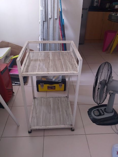 Stove Table with tiles (Category: Shelves, Cabinets & Racks) located in Quezon City. Submitted by susmaryosep1 (Listing ID 1462384116, Image 1). Description: Stove Table with tiles - Sturdy white metal frame - Rolls easily on small wheels for convenient placement - Ideal for organizing your kitchen, bathroom, or workshop - Shows minor scuffs on the frame from normal use 2k .