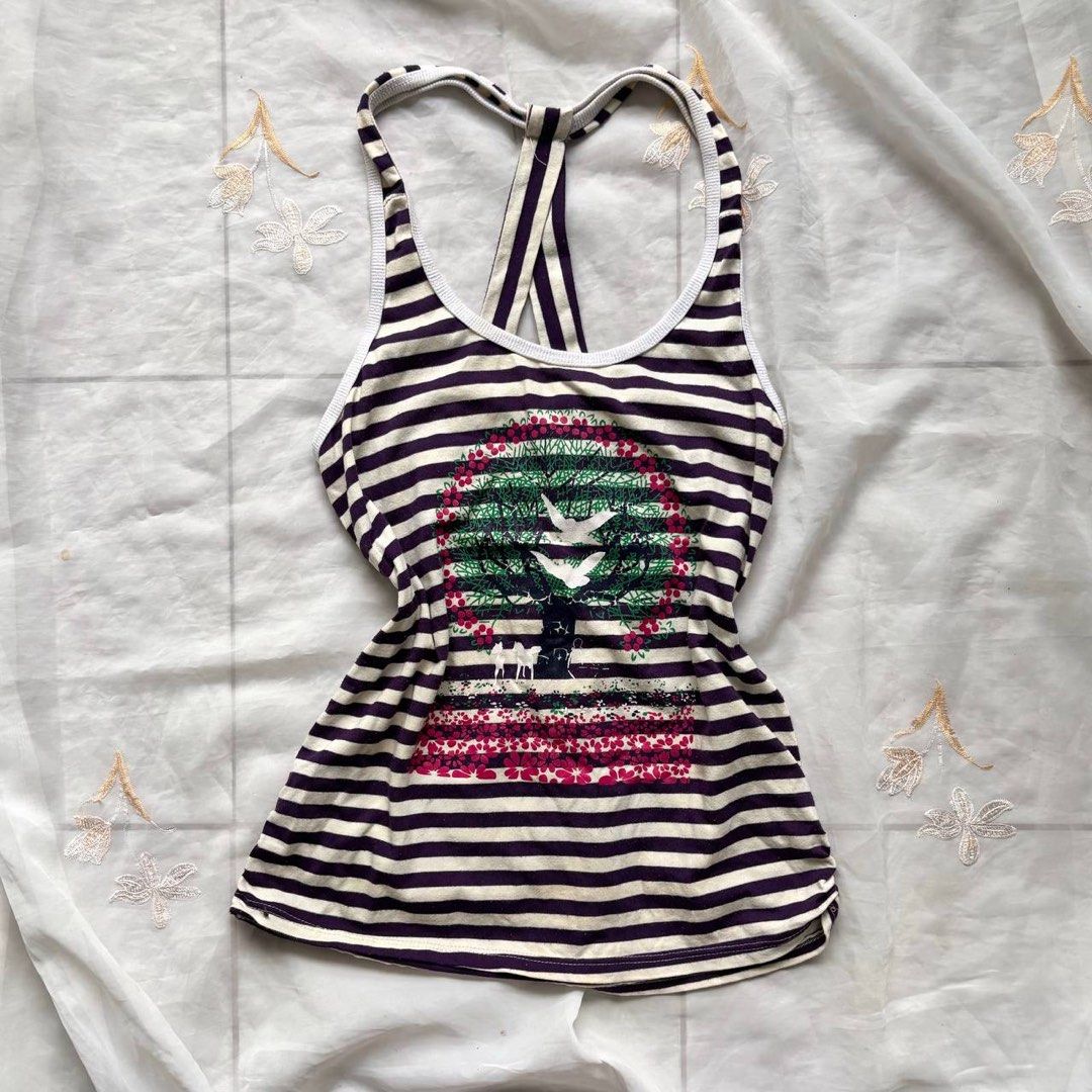 Striped Tank Top with Tree and Bird Graphic (Category: Sleeveless) located in Manila. Submitted by petalfinds_ (Listing ID 1462390115, Image 1). Description: ᥫ᭡.ִֶָ𓂃 violet stripe halter top ౨ৎ 𝐛𝐫𝐚𝐧𝐝: ౨ৎ 𝐬𝐢𝐳𝐞: small to medium 🫧⋆｡˚ 𝐝𝐞𝐭𝐚𝐢𝐥𝐬: ang gandaaa! no issue! 🤍 ─── ⋆⋅☆⋅⋆ ── 𝖒𝖎𝖓𝖊 (𝖆𝖚𝖙𝖔 𝖞𝖔𝖚𝖗𝖘): 149.