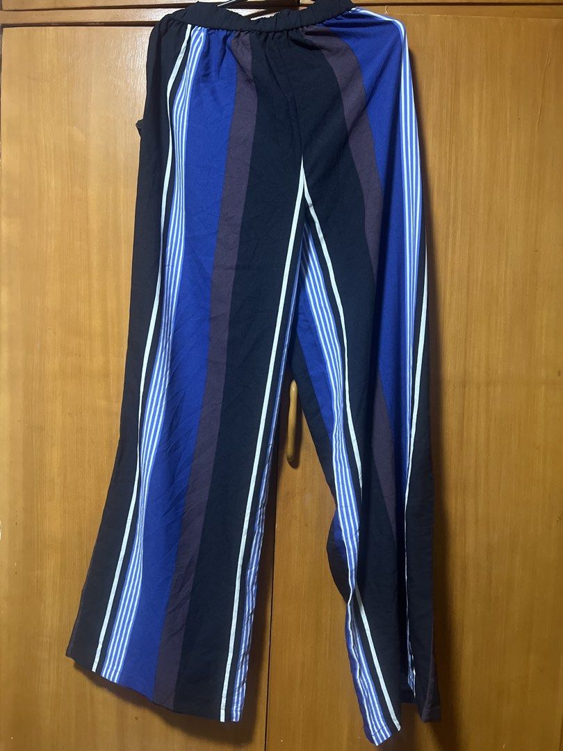 Striped Wide Leg Pants (Category: Other Bottoms) located in Pasig City. Submitted by zebteashoppe01 (Listing ID 1462365079, Image 2). Description: - Trendy striped wide-leg pants - Comfortable elastic waistband - Versatile: great for casual or dressing up - Unique and eye-catching color combination - Enjoy the flattering, flowy fit.