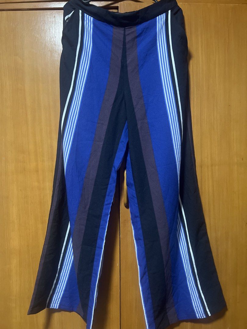 Striped Wide Leg Pants (Category: Other Bottoms) located in Pasig City. Submitted by zebteashoppe01 (Listing ID 1462365079, Image 1). Description: - Trendy striped wide-leg pants - Comfortable elastic waistband - Versatile: great for casual or dressing up - Unique and eye-catching color combination - Enjoy the flattering, flowy fit.