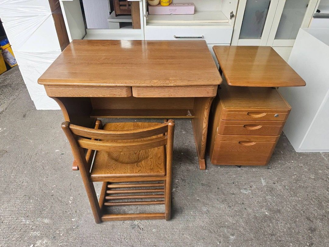 Study desk (Category: Tables & Sets) located in Meycauayan. Submitted by marygracecasimiro (Listing ID 1462327158, Image 1). Description: Study Desk w/ Pedestal & Chair ‼️₱8800‼️ ✔L-39 H-29 W-25.5 inches ✔5 Drawers 🗄 ✔️Solidwood! 💢 ✔Scratches As-is! 👌💜.
