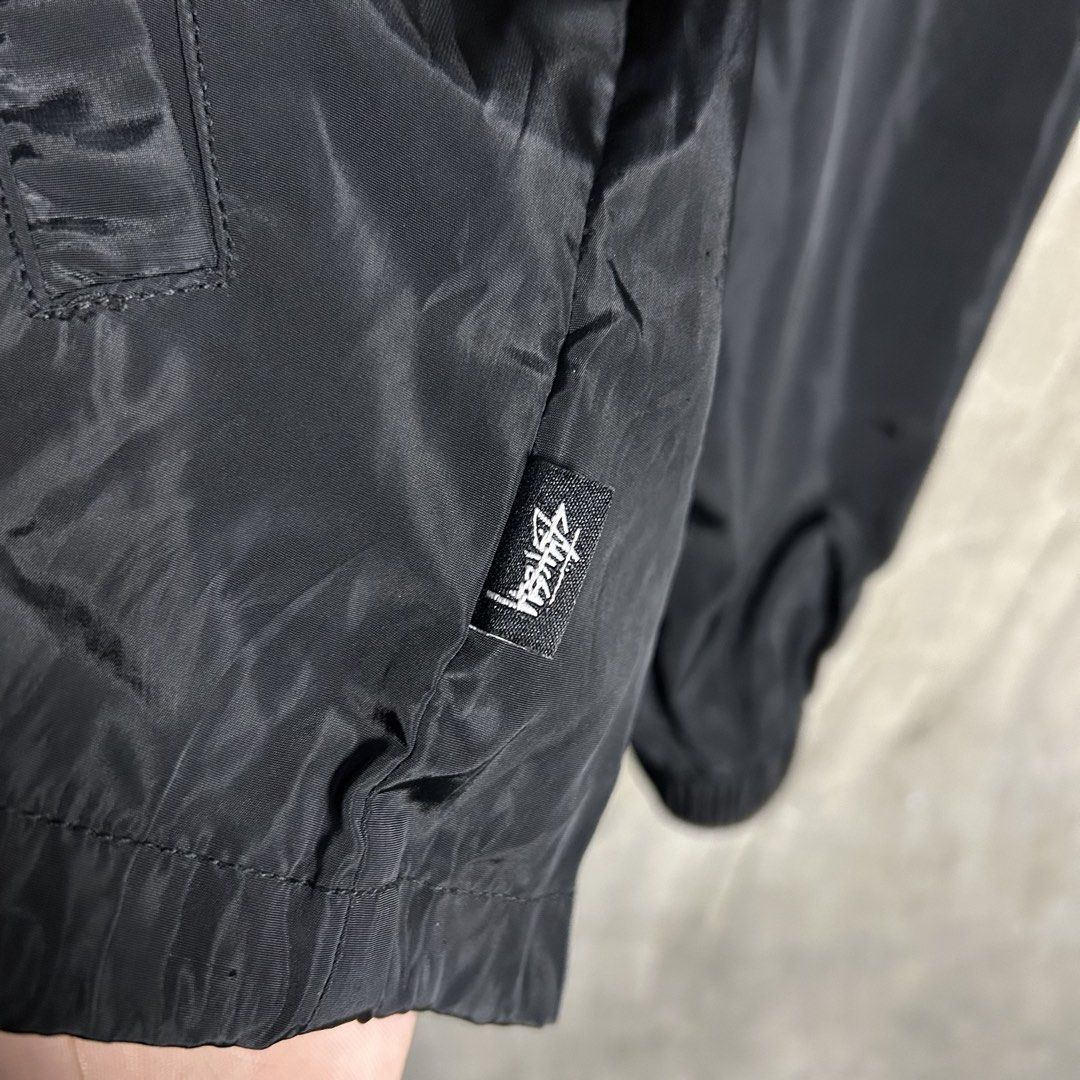 Stussy - Womens Coach Jacket (Category: Coats, Jackets and Outerwear) located in Tayabas. Submitted by streetdepartment (Listing ID 1462267842, Image 3). Description: Stussy - Womens Coach Jacket Measurements (inches): Width: 18.8” Length: 23” Tagged as XS Very good condition Flaw/s: cracks and repaired hole.