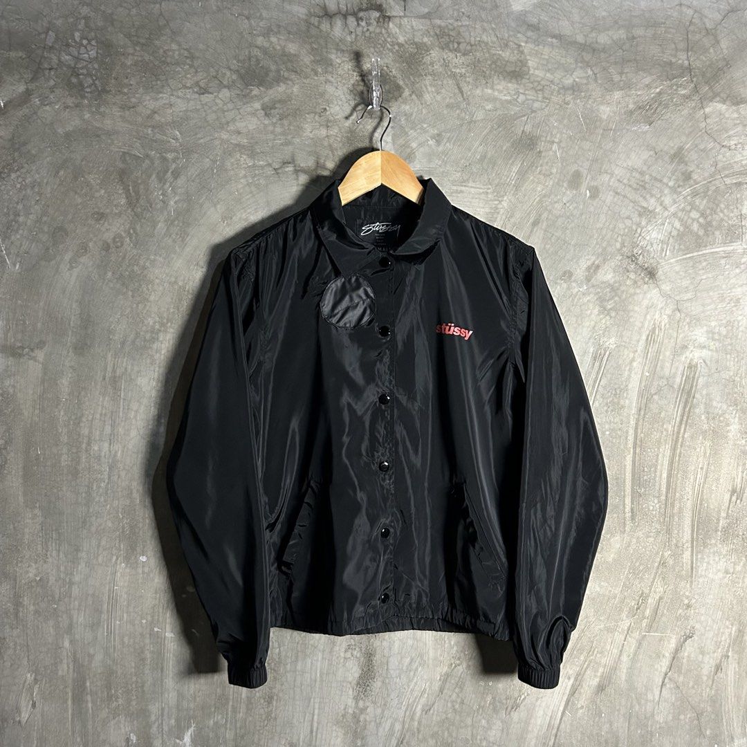 Stussy - Womens Coach Jacket (Category: Coats, Jackets and Outerwear) located in Tayabas. Submitted by streetdepartment (Listing ID 1462267842, Image 1). Description: Stussy - Womens Coach Jacket Measurements (inches): Width: 18.8” Length: 23” Tagged as XS Very good condition Flaw/s: cracks and repaired hole.