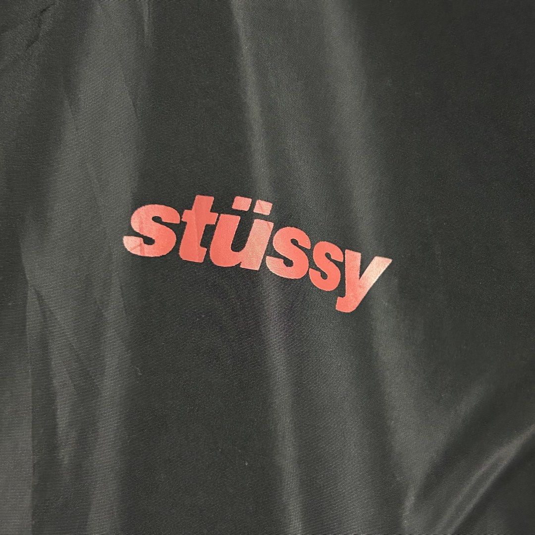 Stussy - Womens Coach Jacket (Category: Coats, Jackets and Outerwear) located in Tayabas. Submitted by streetdepartment (Listing ID 1462267842, Image 2). Description: Stussy - Womens Coach Jacket Measurements (inches): Width: 18.8” Length: 23” Tagged as XS Very good condition Flaw/s: cracks and repaired hole.