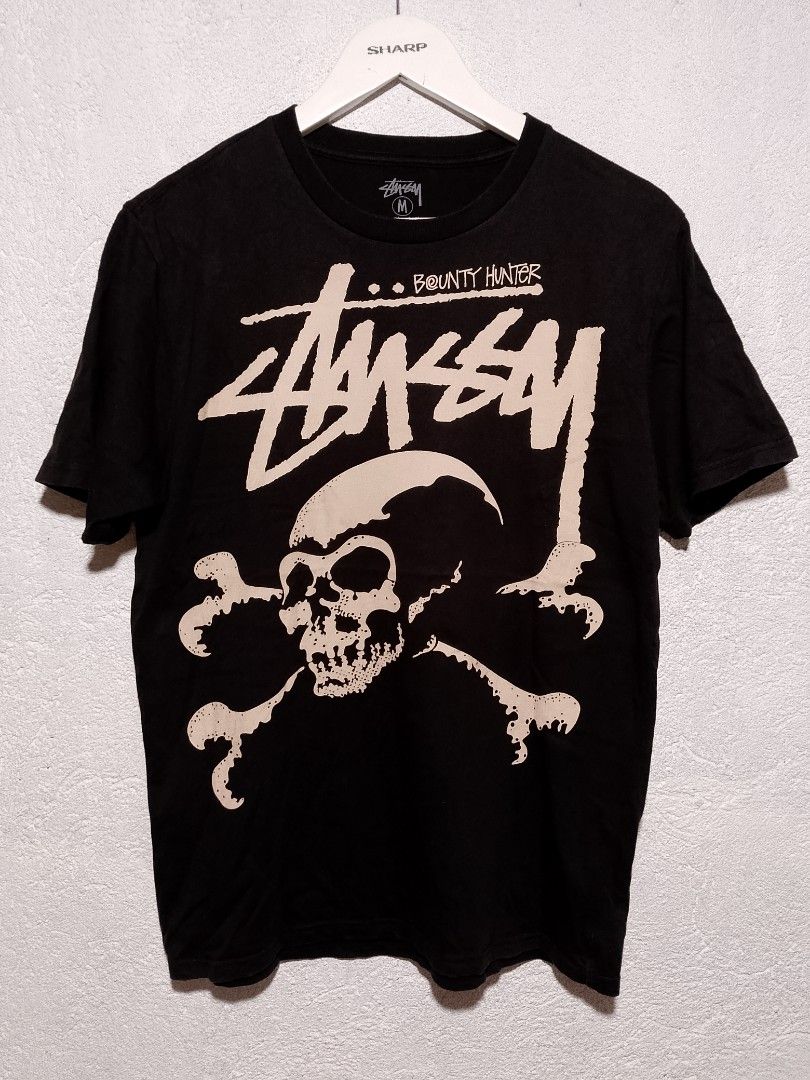 Stussy bounty hunter tshirt (Category: Tshirts & Polo Shirts ) located in Manila. Submitted by pj.thrift (Listing ID 1462362819, Image 1). Description: excellent condition size: medium on tag width: 20 length: 28 color rate: 9.5/10.