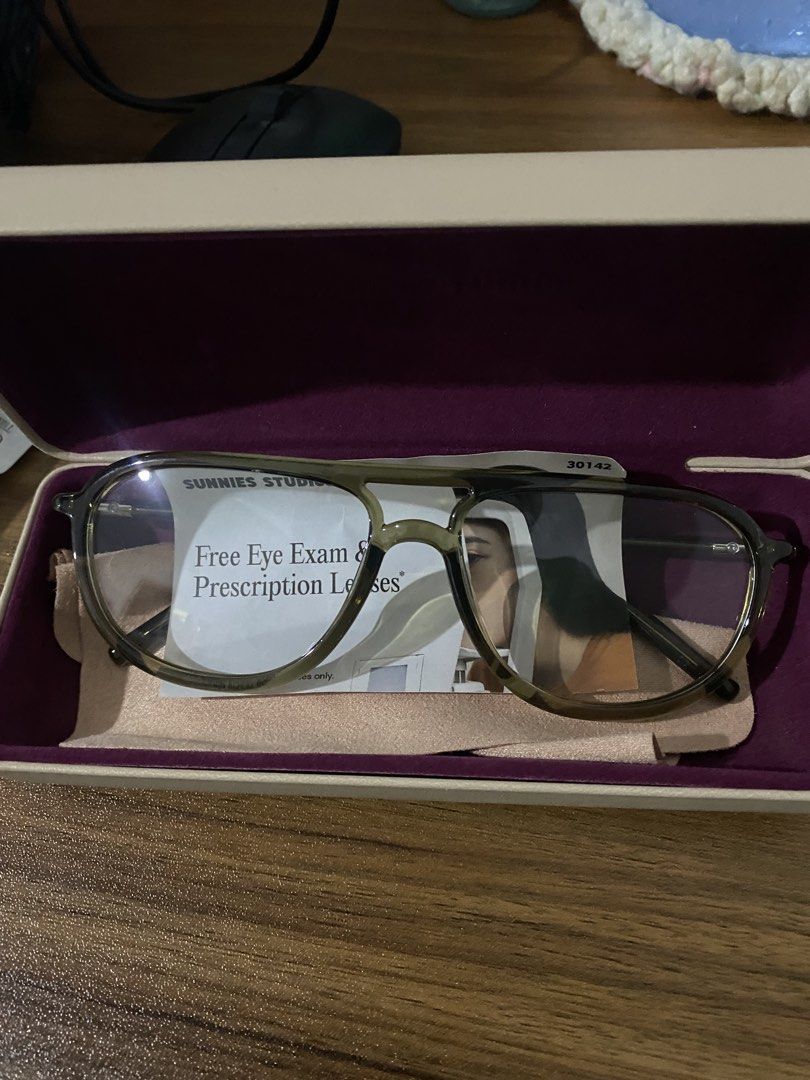 Sunnies Studio Astrid Aviator Eyeglasses - Brown (Category: Sunglasses & Eyewear) located in Carmona. Submitted by mrll_ (Listing ID 1462327704, Image 3). Description: Selling my Sunnies Studio Astrid eyeglasses. These are the aviator style in Basil color. They come with the original case. I got them recently but they aren't quite my style. They have clear lenses, but you can get prescription lenses fitted. Brand new condition..
