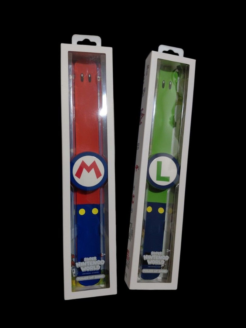 Super Mario Nintendo World Power-Up Bands (Category: Character Goods) located in Navotas City. Submitted by sanrio_galore (Listing ID 1462428229, Image 2). Description: ■Collectible items bought inside the theme park ■Super Nintendo World Power-Up Bands for Luigi and Mario ■Sold as is. Used only once. ■Sold as a set. ■Power-Up Bands transform the entire Super Nintendo World area into a live-action, interactive video game. They do not contain batt