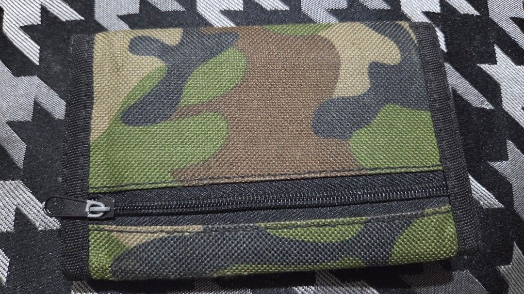 Supreme Camo Trifold Wallet (Category: Luxury Bags & Wallets) located in Quezon City. Submitted by kctheexplorer05 (Listing ID 1462329679, Image 2). Description: - Supreme wallet in classic camouflage pattern - Trifold design - Zippered coin pocket on the outside - Interior card slots - Clear ID window - Durable fabric construction - Ideal for everyday use -WYIWYG .