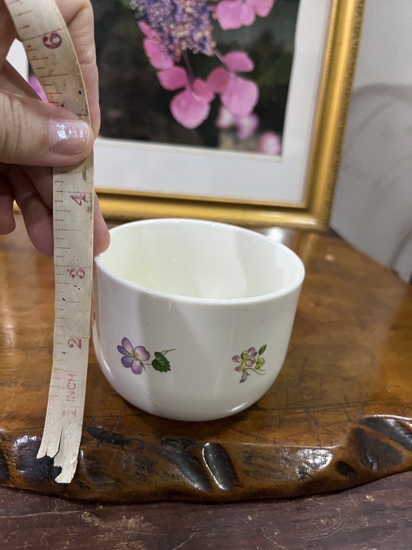Sweet Violet Floral Cup (Category: Coffee & Tea Tableware) located in Taguig. Submitted by minmin_parker (Listing ID 1462395071, Image 3). Description: - Adorable cup with a charming floral design. - Features sweet violets and leaves. - "Sweet Violet" text is printed on the cup. - Ideal for enjoying your favorite tea or coffee. - Adds a lovely touch to your kitchen decor..
