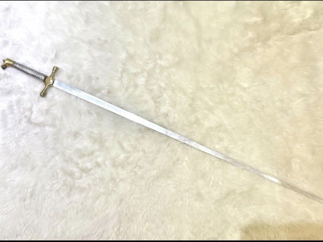 Sword saber Wedding Ceremonial Cake Cutting props (Category: Everything Else Others) located in Pasig City. Submitted by designeritems4less (Listing ID 1462287119, Image 3). Description: FOR RENT! This is a real sw0rd! It is not a plastic prop! Made of brass and heavy metal. Perfect for costume props and especially for weddings. It can be used to cut the wedding cake too! Cutting a wedding cake with a sw0rd has become a unique and memorable trend