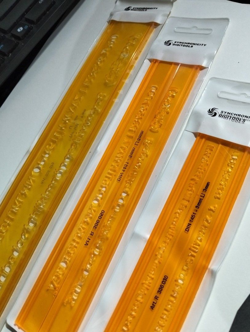 Synchronicity Digitools Stencils - Set of 3 (Category: Craft Supplies & Tools) located in Makati City. Submitted by julesial (Listing ID 1462370234, Image 1). Description: - Set of 3 Synchronicity Digitools stencils - Perfect for drawing letters and numbers. - Good for engineering and architecture students - Comes in various sizes for different uses - Colors: Orange and Yellow - Brand new, still in original packaging.