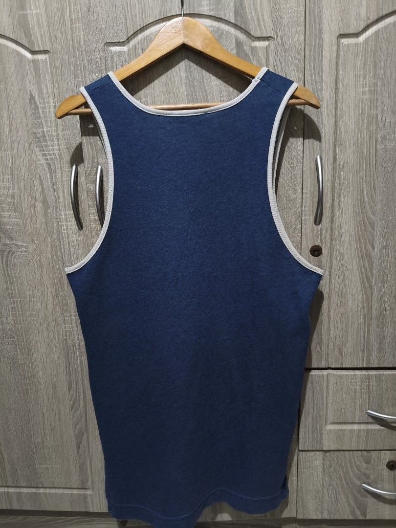 Tank Top (Category: Activewear) located in Caloocan City. Submitted by 88Episode (Listing ID 1462279150, Image 2). Description: Undefeated Tank Top 599 Plus SF Large Very Good Condition Issue:Pinhole Location: Valenzuela City.