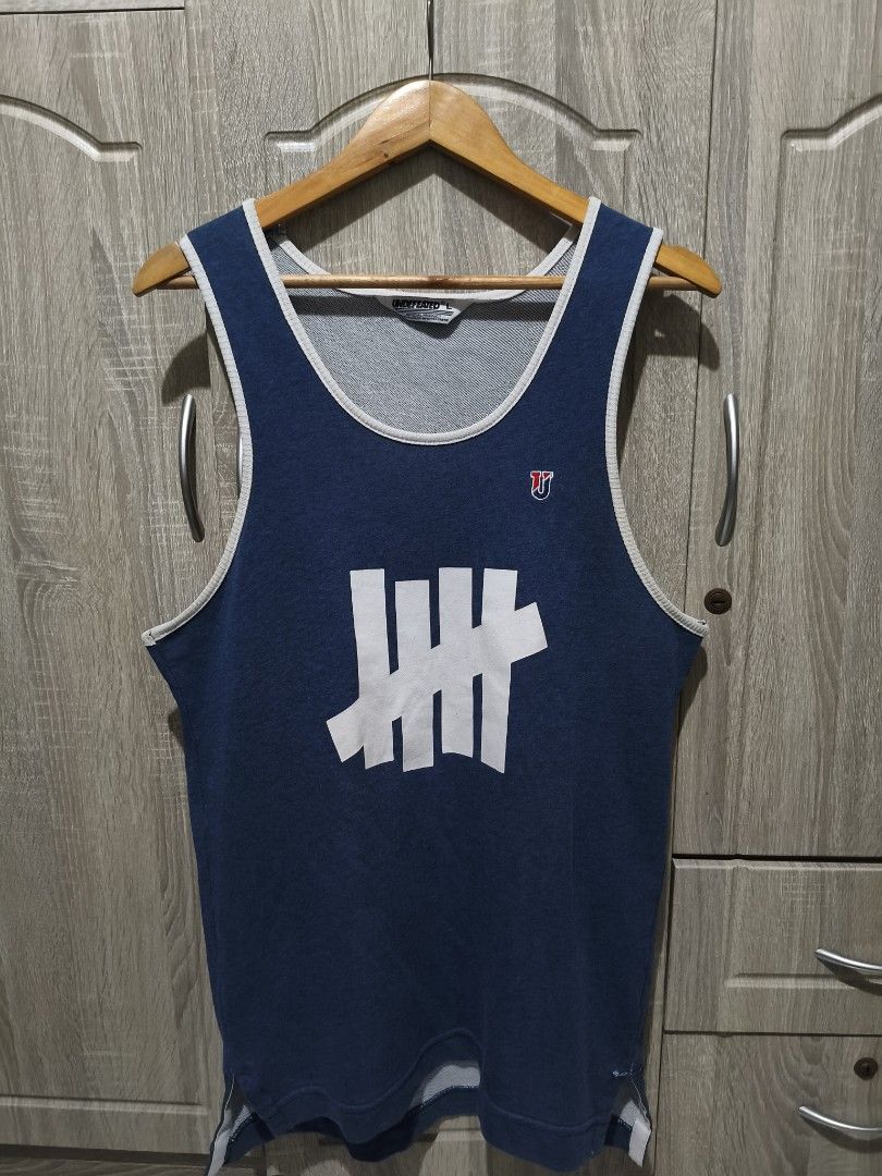 Tank Top (Category: Activewear) located in Caloocan City. Submitted by 88Episode (Listing ID 1462279150, Image 1). Description: Undefeated Tank Top 599 Plus SF Large Very Good Condition Issue:Pinhole Location: Valenzuela City.