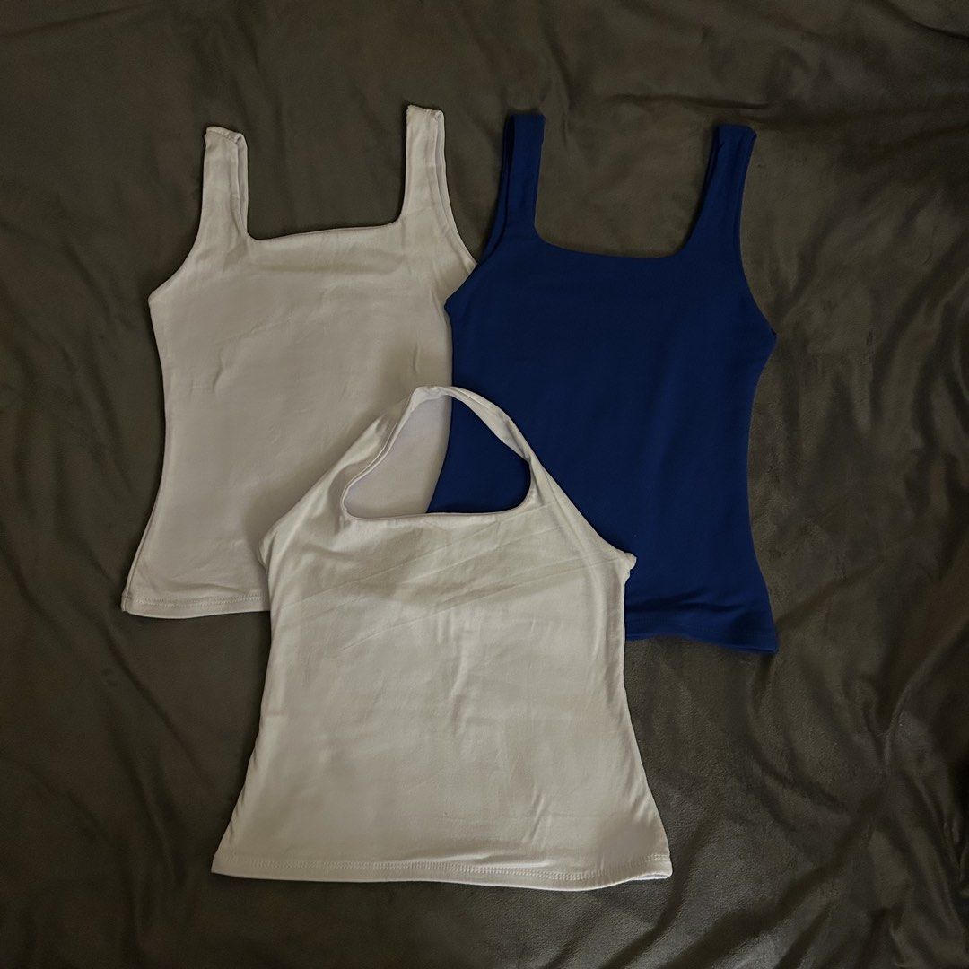 Tank Top set - White and Blue (Category: Sleeveless) located in Davao. Submitted by excessexpress (Listing ID 1462429341, Image 1). Description: all 3 for ₱300 never been used Selling three tank tops. Two are white, one is royal blue. One white tank has a halter neck. The other two have square necklines. Great basics for layering or wearing on their own. Comfortable and versatile..