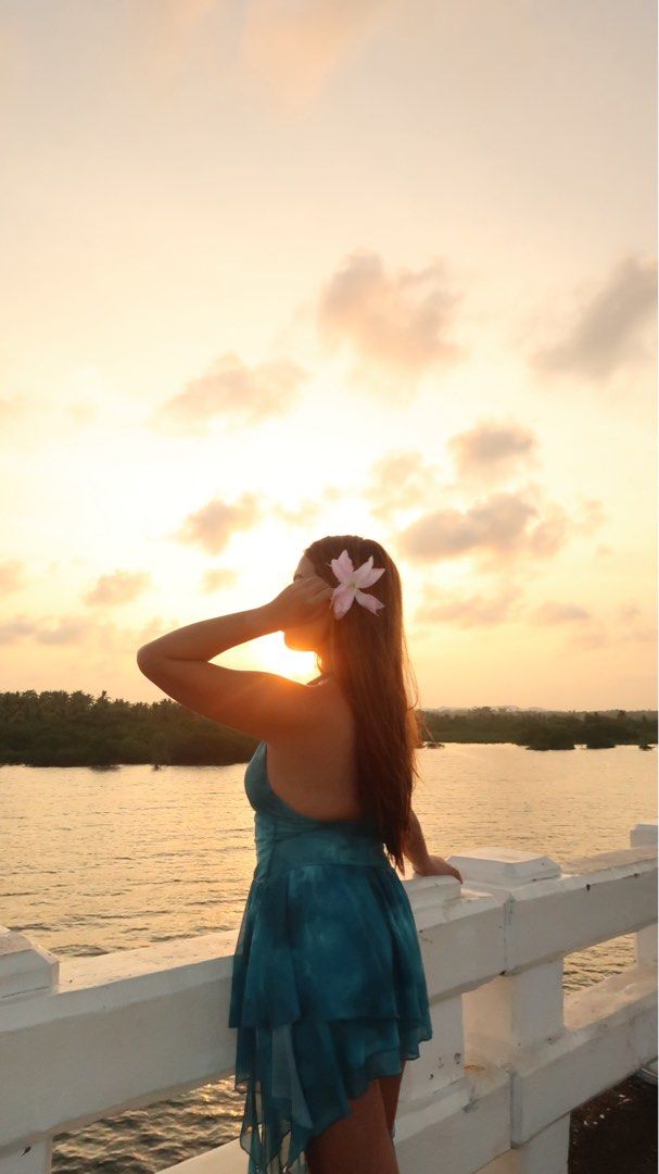 Teal Halter Neck Ruffled Mini Dress (Category: Dresses) located in Manila. Submitted by jminacraf26908 (Listing ID 1462214961, Image 2). Description: - Teal halter neck mini dress - Ruching detail on the bodice - Ruffled hemline - Ties at the back - Ideal for beach vacations or summer parties - Lightweight and flowy fabric.