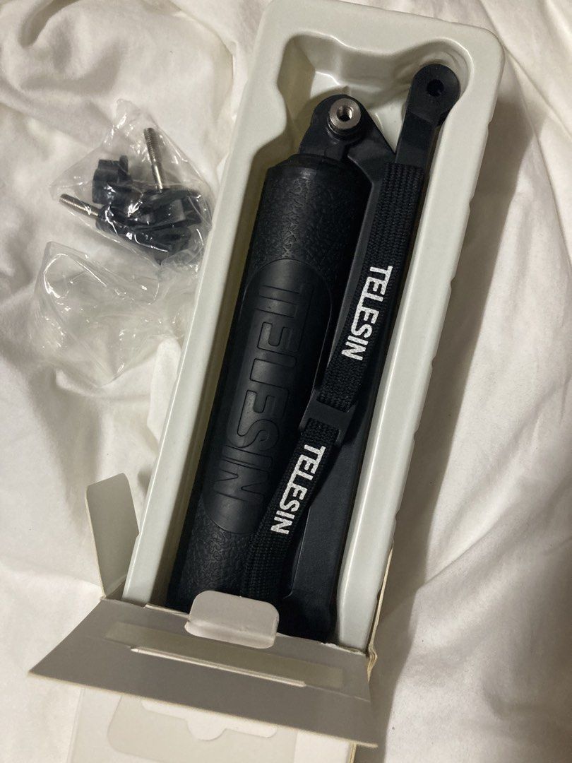TELESIN Multi-functional Tri-fold Selfie Stick for Go Pro (Category: Tripods & Monopods) located in Quezon City. Submitted by mmanna (Listing ID 1462426585, Image 2). Description: - TELESIN tri-fold selfie stick for Go Pro - Versatile: use as a grip or tripod - Includes mounting accessories - Ideal for vlogging and travel shots - Compact and portable design.