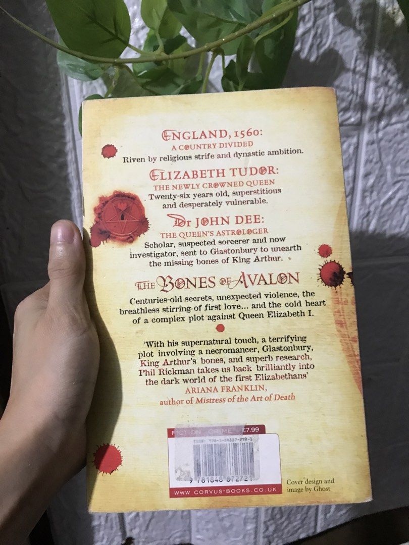 The Bones of Avalon by Phil Rickman (Category: Storybooks) located in Pilar. Submitted by dhelsomera20308 (Listing ID 1462392341, Image 2). Description: - Title: The Bones of Avalon by Phil Rickman - Setting: England, 1560 - Plot: Dr John Dee searches for King Arthur's missing bones, facing religious strife, dynastic ambition, and a necromancer. - Key Locations: Glastonbury - Format: Paperback - Condition: Pages are slightly yellowed from age..
