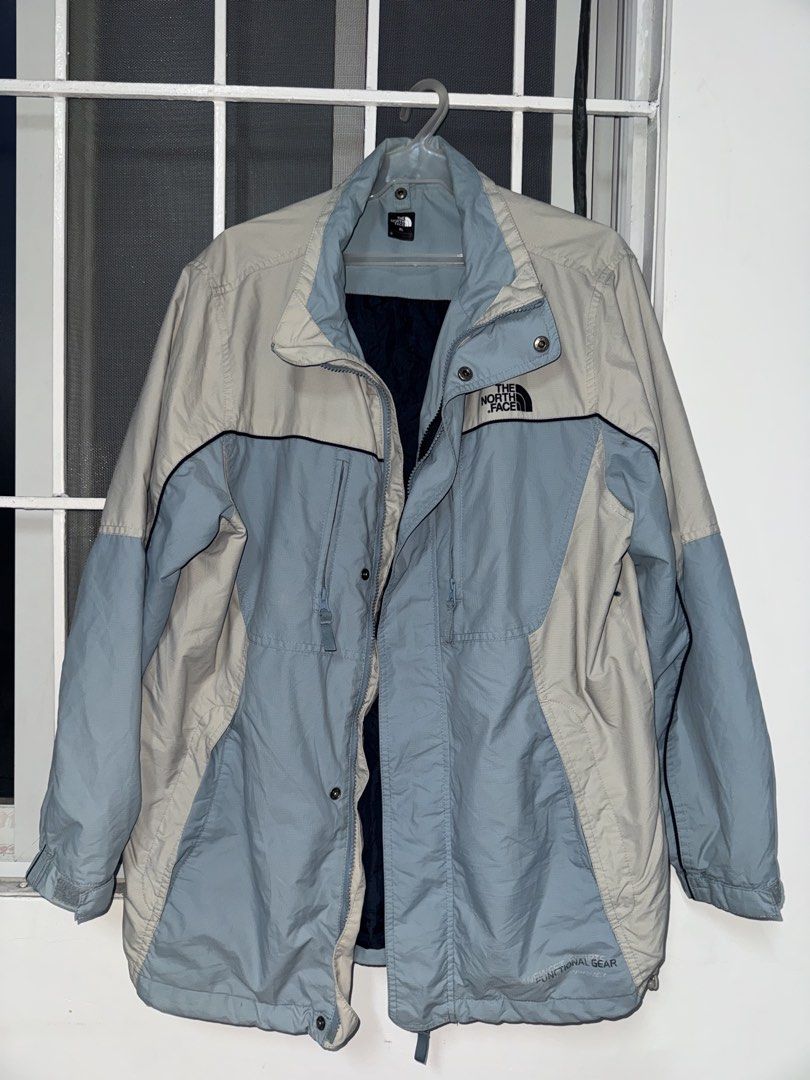 The North Face Vintage Jacket (Category: Coats, Jackets and Outerwear) located in Caloocan City. Submitted by cocointhesea (Listing ID 1462370708, Image 1). Description: - Brand: The North Face - Color: Beige and Light Blue - Closure: Zip-up front with snap buttons - Pockets: 2 zip chest pockets, 2 snap lower pockets - Design: Color block design on front and back - Ideal for: Outdoor activities North Face Vintage Jacket XL 400 + sf Prestine Condi