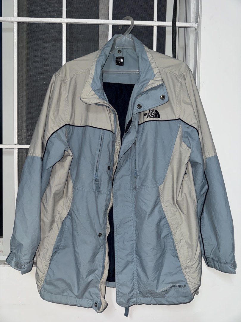 The North Face Vintage Jacket (Category: Coats, Jackets and Outerwear) located in Caloocan City. Submitted by cocointhesea (Listing ID 1462370708, Image 2). Description: - Brand: The North Face - Color: Beige and Light Blue - Closure: Zip-up front with snap buttons - Pockets: 2 zip chest pockets, 2 snap lower pockets - Design: Color block design on front and back - Ideal for: Outdoor activities North Face Vintage Jacket XL 400 + sf Prestine Condi