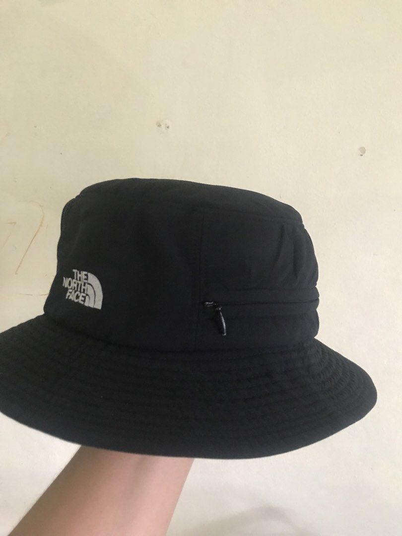 The North Face Summit Series Bucket Hat Black (Category: Caps & Hats) located in Quezon City. Submitted by damn_used (Listing ID 1462439096, Image 3). Description: - Brand: The North Face - lightweight Bucket Hat - nylon polyester material - 10/10 condition - Color: Black - 58-60cm diameter 7 1/2 - Features: Summit Series logo, small zippered side pocket - Condition: Good - Ideal for: Outdoor activities, casual wear 949.