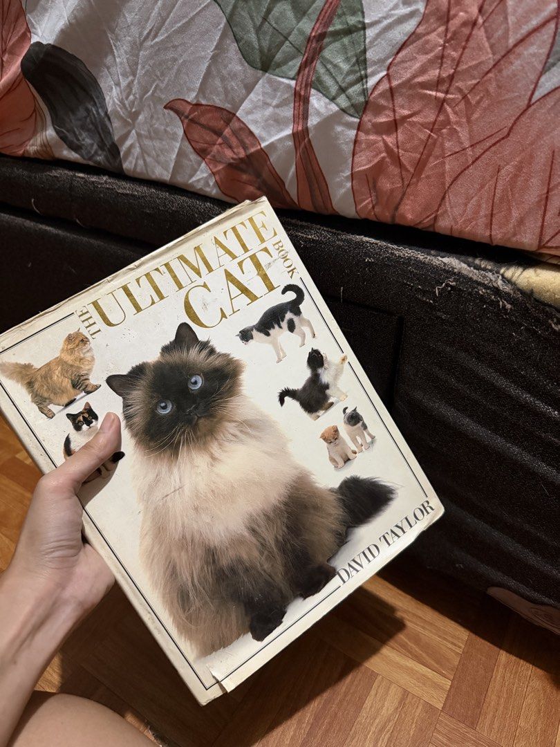 The Ultimate Cat Book (Category: Textbooks) located in Quezon City. Submitted by bananak1tchen (Listing ID 1462387807, Image 1). Description: RFS: Decluttering MOP: Gcash MOD: SDD, J&T.
