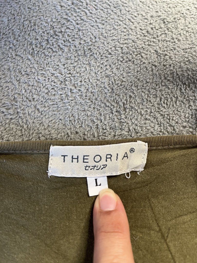 THEORIA sleeveless tops (Category: Sleeveless) located in Tarlac. Submitted by __why2k (Listing ID 1462341219, Image 2). Description: THEORIA this is an olive green camisole featuring a contrasting florallace panel across the bust. .