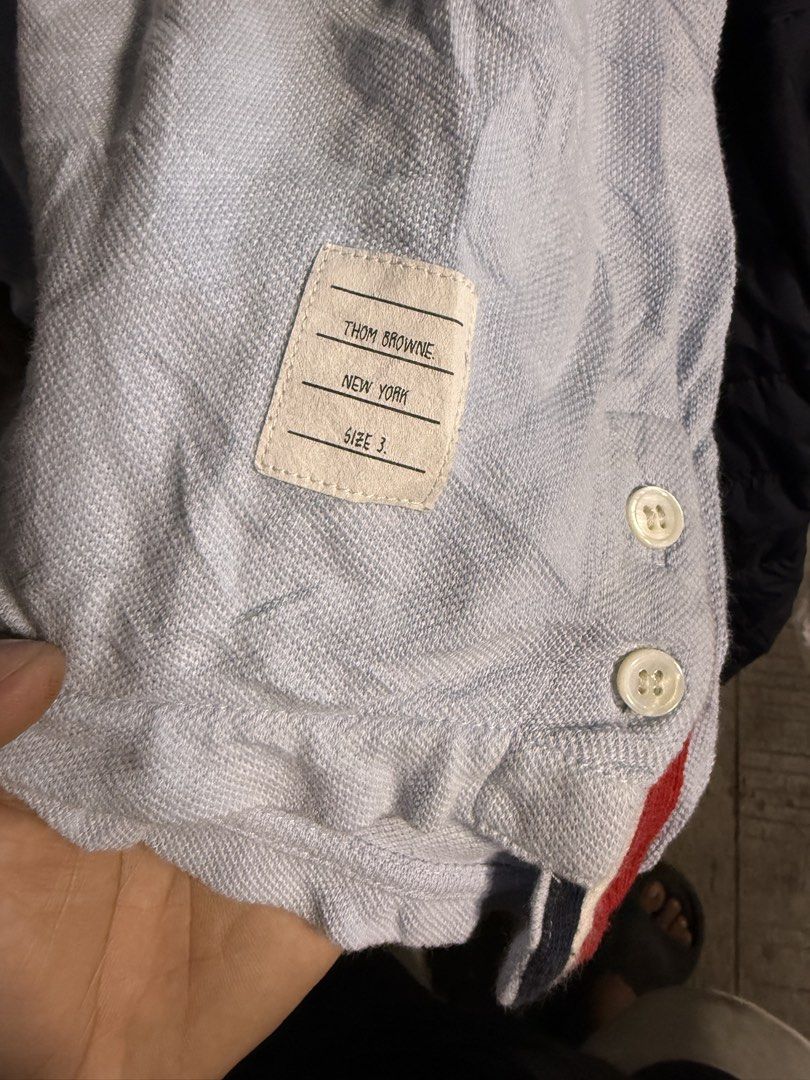 Thom Browne polo shirt (Category: Tshirts & Polo Shirts ) located in Surallah. Submitted by evanskie021890 (Listing ID 1462295061, Image 3). Description: Thom browne polo shirt As new No issue 9.9/10 color rate Size 3 on tag Large men 2500 only.