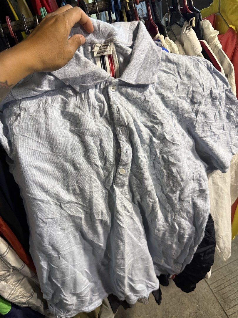 Thom Browne polo shirt (Category: Tshirts & Polo Shirts ) located in Surallah. Submitted by evanskie021890 (Listing ID 1462295061, Image 1). Description: Thom browne polo shirt As new No issue 9.9/10 color rate Size 3 on tag Large men 2500 only.