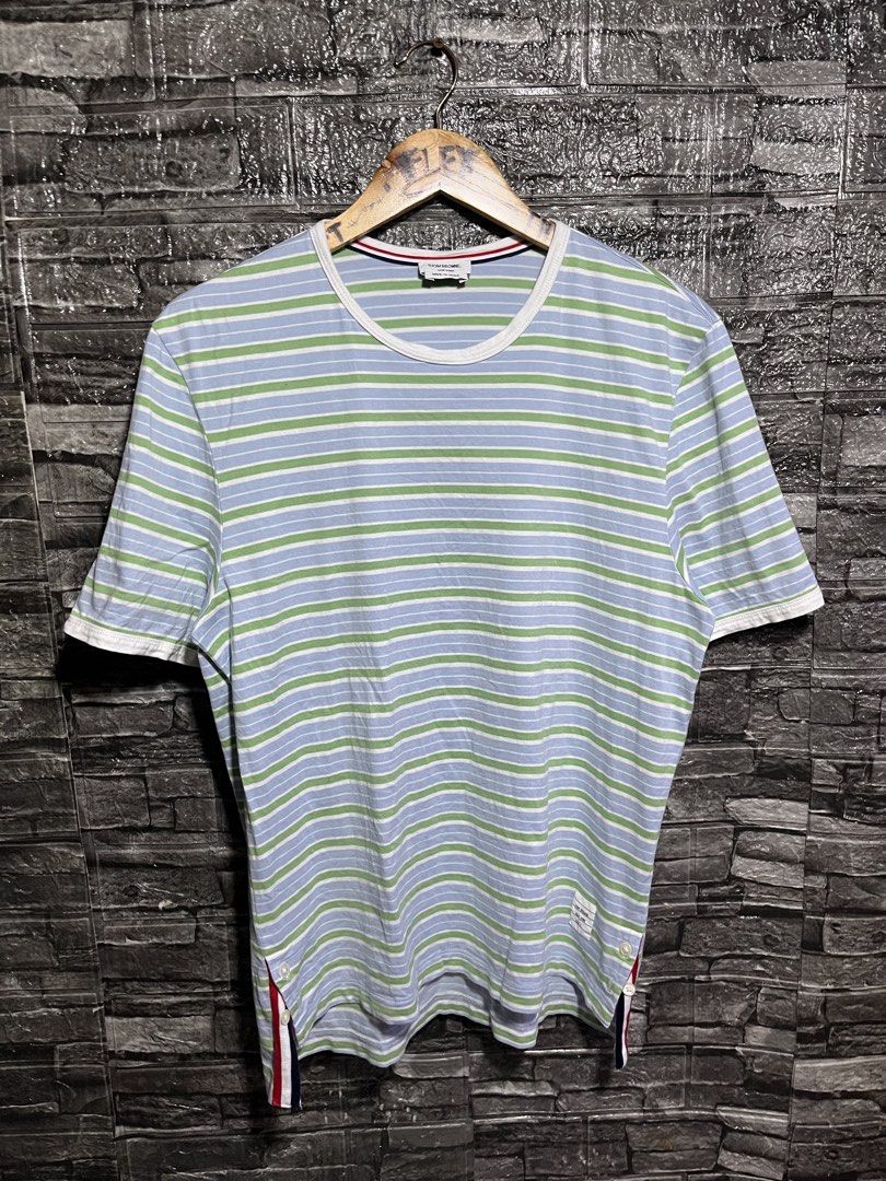 Thom browne Striped Crew Neck Shirt (Category: Luxury Apparel) located in Manila. Submitted by flex_curation (Listing ID 1462386264, Image 1). Description: 20X26 FRONT LENGTH 27BACK IN VERY GOOD CONDITION BACOOR CAVITE LOC.
