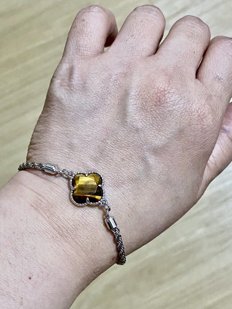 Tiger Eye Clover Bracelet (Category: Bracelets) located in Pasig City. Submitted by talaversify (Listing ID 1462333206, Image 3). Description: Semi-precious stone: Tiger Eye Stone size: 15mm x 5mm Wrist size: 16cm to 20cm 💠 Natural stone 💠.