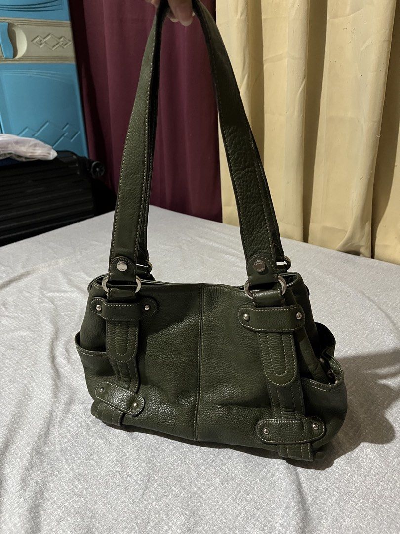 Tignanello Leather Tote Bag (Category: Tote Bags) located in Manila. Submitted by az0r_ (Listing ID 1462411416, Image 3). Description: - Stylish olive green pebbled leather tote bag - Comfortable double shoulder straps - Convenient side pockets for easy access - Elegant silver hardware details - Roomy interior for all your essentials - Your perfect everyday companion!.