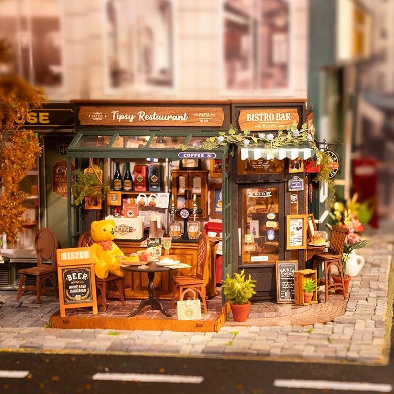 Tipsy Restaurant (Category: Designer & Blind Box Toys) located in Manila. Submitted by connectingparts (Listing ID 1462295120, Image 3). Description: Rolife DIY Miniature House - Tipsy Restaurant DG167 A super charming bistro bar miniature! Complete with tiny beer taps, cozy tables, teddy bear customer, and warm LED lighting. Build your own little hangout spot! ✅ 297 Pcs DIY Miniature House - Tipsy Restaurant ✅ Bistro Bar Theme - Super Detailed &