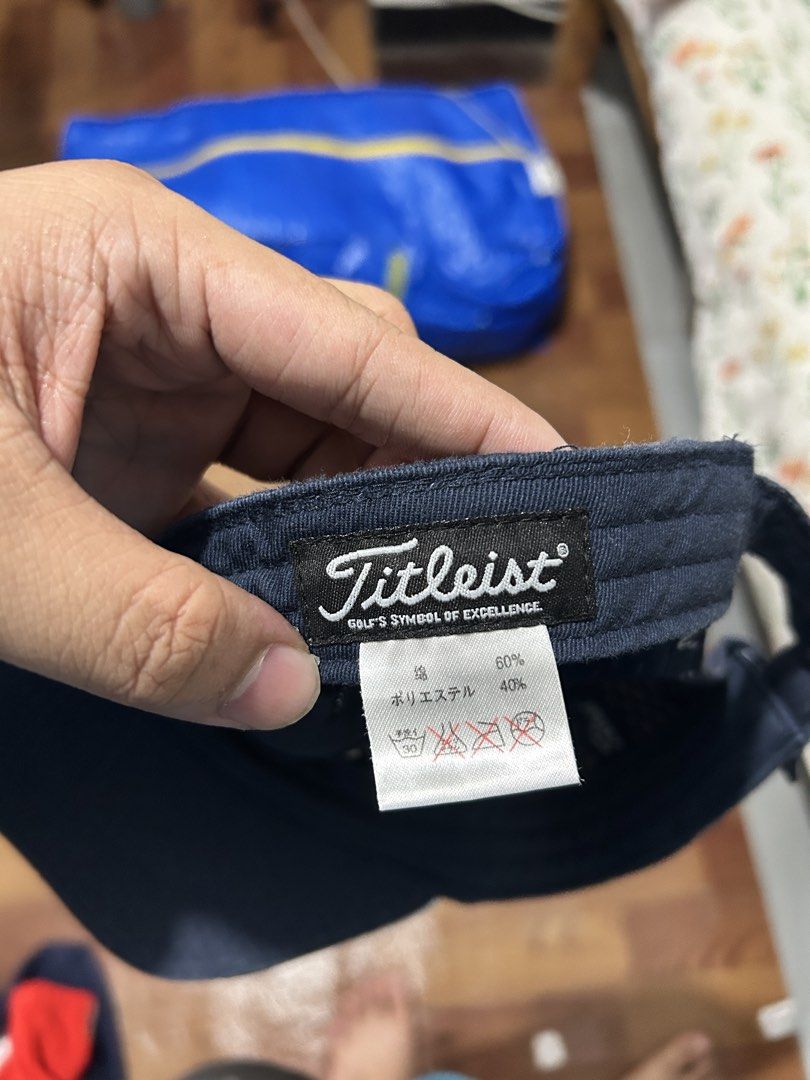 Titleist Golf Cap (Category: Caps & Hats) located in Davao. Submitted by orbetaarch23339 (Listing ID 1462352001, Image 3). Description: - Dark blue Titleist cap - Breathable mesh material - Adjustable strap for a custom fit - Features Titleist logo on front and back - Ideal for golf or everyday casual wear.